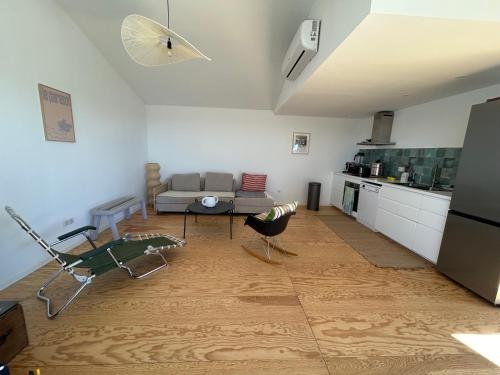 Kuchyň nebo kuchyňský kout v ubytování Cabanon moderne, les pieds dans l'eau, 2 chambres