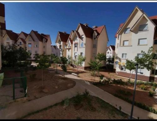 a row of houses in a residential neighborhood at Les jardins d'Ifrane in Ifrane