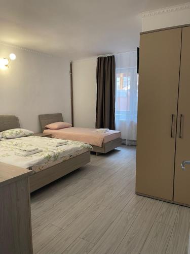 En eller flere senger på et rom på Casa Princess
