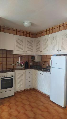 Η κουζίνα ή μικρή κουζίνα στο Son Bou Bonito y renovado Apartamento