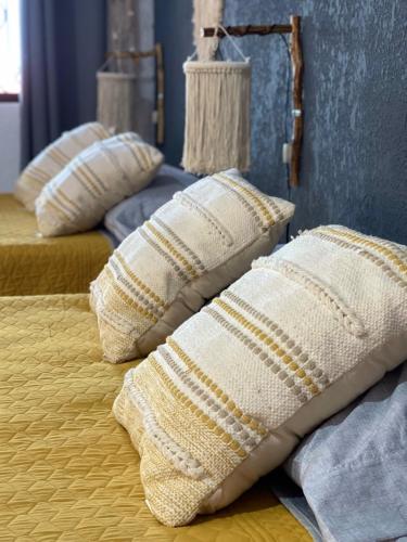 Ένα ή περισσότερα κρεβάτια σε δωμάτιο στο Itzé Hostel Boutique - Progreso