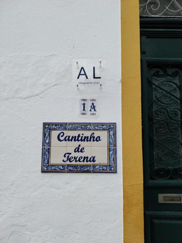a sign on the side of a building at Cantinho de Terena in Terena