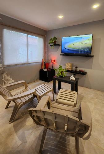 TV a/nebo společenská místnost v ubytování Monoambiente en casa familiar