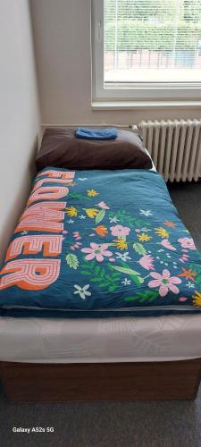 Een bed of bedden in een kamer bij TJ BANÍK OSTRAVA