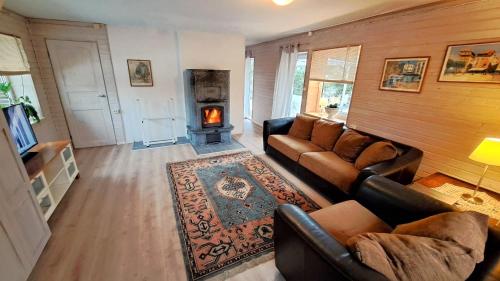 Predel za sedenje v nastanitvi Private Holiday home near Tallinn, free parking