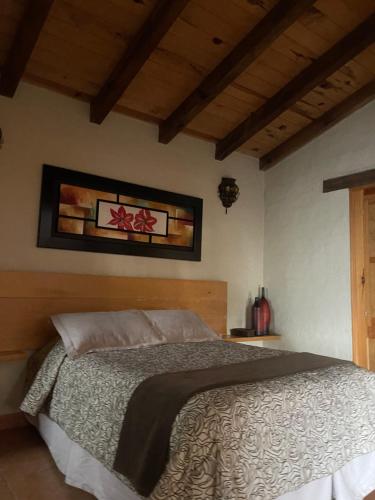 Cama ou camas em um quarto em Wisteria