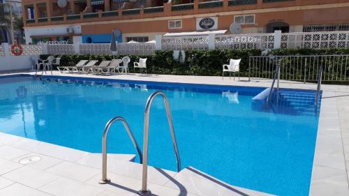 Bazén v ubytování Apartamento a pie de playa. nebo v jeho okolí