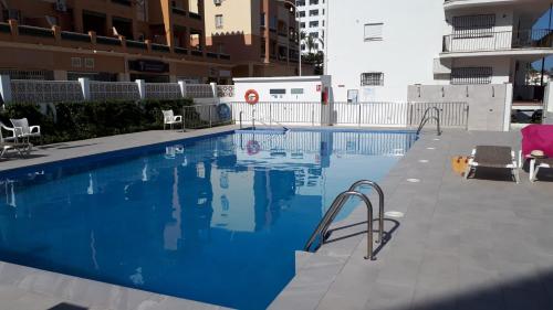 Bazén v ubytování Apartamento a pie de playa. nebo v jeho okolí