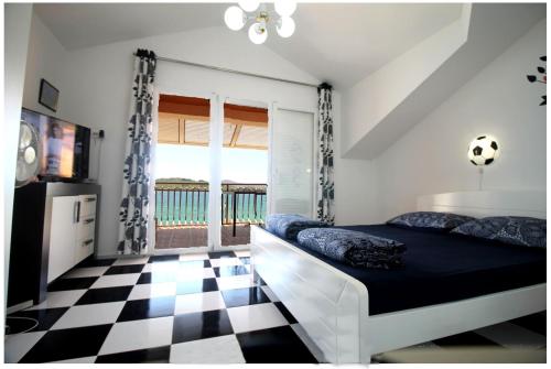 Postel nebo postele na pokoji v ubytování Villa Aurelia Vodice