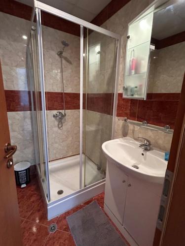 a bathroom with a shower and a sink at Paradise View in Sunny Beach