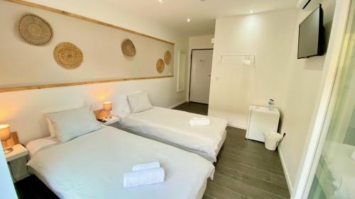 Ένα ή περισσότερα κρεβάτια σε δωμάτιο στο Golden Stay Experience