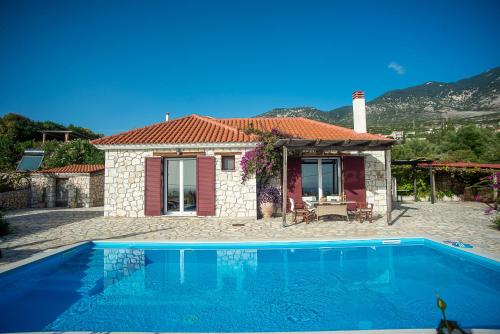 Πισίνα στο ή κοντά στο Trapezaki Garden Villas