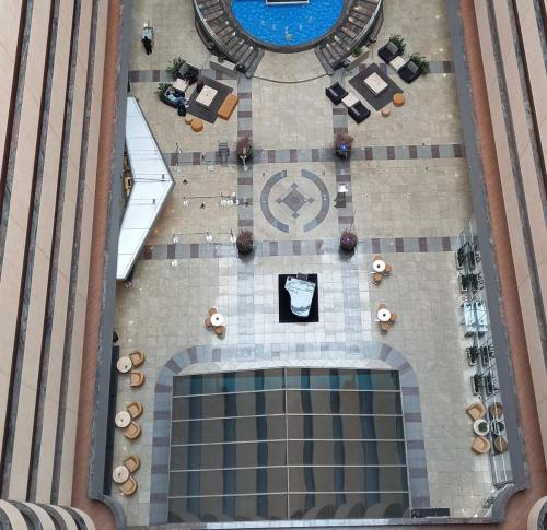 an aerial view of a swimming pool in a building at International Airport Flat - Guarulhos quarto 1267 in Guarulhos