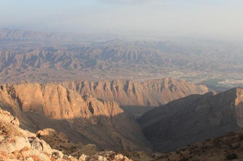 an aerial view of a desert mountain range at Sama Heights Resort in Dār Sawdāʼ