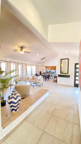 a living room with a couch and a table at Ajijic San Antonio Lake Chapala Villas - Pickleball Court - Gym in San Antonio