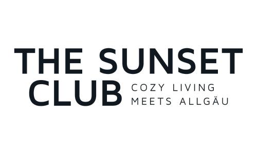 a logo for the sunset club at theSunset Club - Studio II - Küche - Balkon - Parken in Memmingen