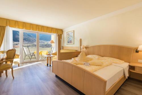 Postel nebo postele na pokoji v ubytování Hotel Funggashof