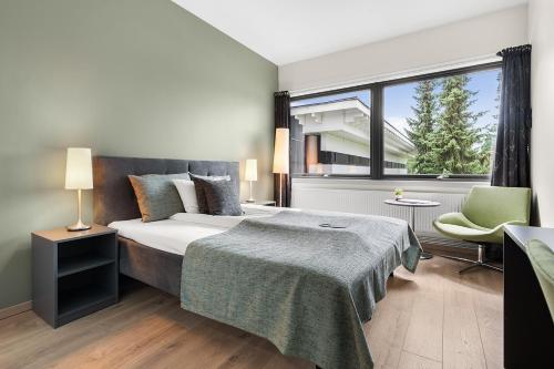Postel nebo postele na pokoji v ubytování Hurdalsjøen Hotel & Spa