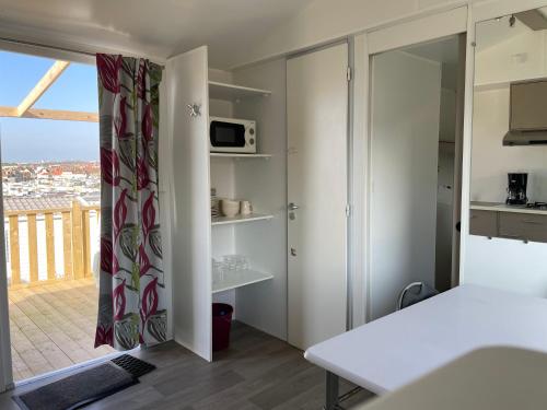 Dapur atau dapur kecil di Mobil home L'heurt de flâner