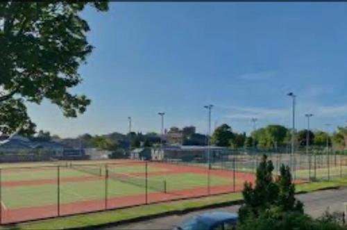 a baseball field with a tennis court at Wellington Retreat in Montrose