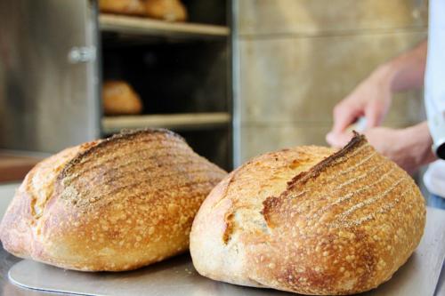 two loaves of bread sitting on top of a counter at Peatlands in Ballybogy