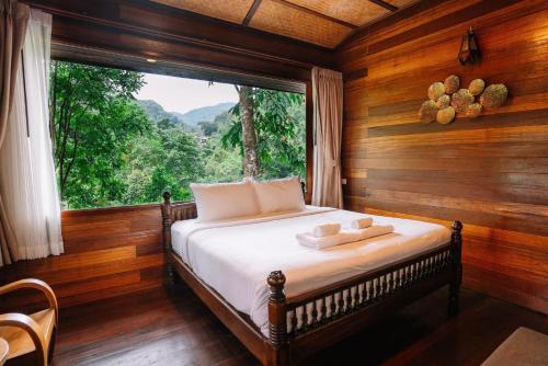 Ein Bett oder Betten in einem Zimmer der Unterkunft Portare.home
