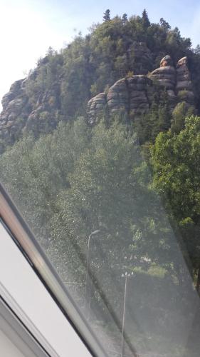 a view of a mountain from a car window at Holzwerk Oybin in Kurort Oybin