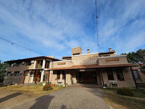 an old building with an antenna on top of it at La Reina Hotel in Santa Rosa de Calamuchita
