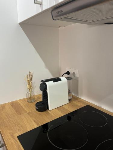 A kitchen or kitchenette at Apartamento Oasis Mediterráneo