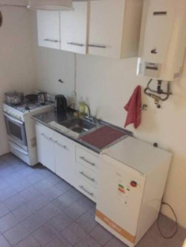 Kjøkken eller kjøkkenkrok på Alegre y práctico departamento en Recoleta