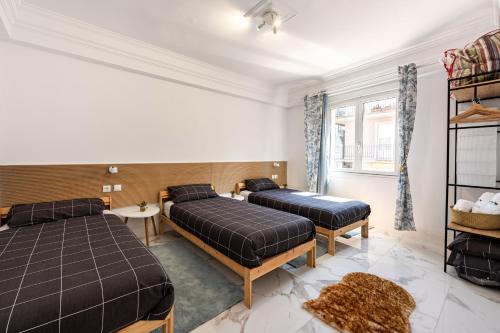 Ένα ή περισσότερα κρεβάτια σε δωμάτιο στο Apartament irun