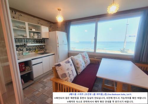Kuchyň nebo kuchyňský kout v ubytování Seaside Pension