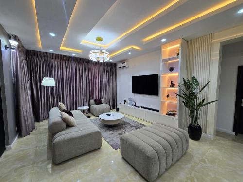 TV a/nebo společenská místnost v ubytování Genesis Grid Homes (Capri Edition)