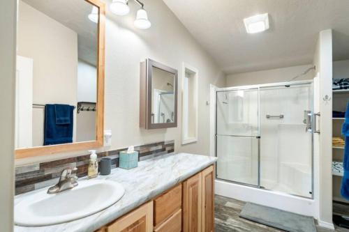 a bathroom with a sink and a shower at Country living in a small town in Deer Park