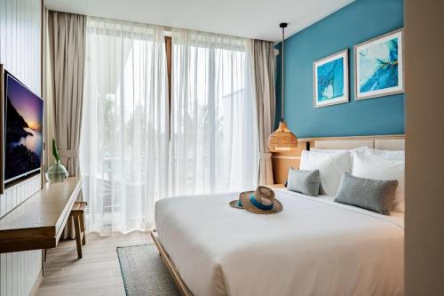 Säng eller sängar i ett rum på The Ocean Resort Quy Nhơn by Fusion - Villa 3 PN