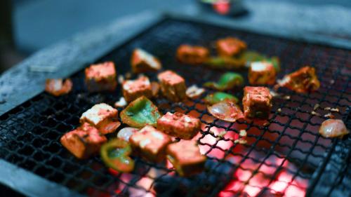 a bunch of food on top of a grill at Aum Villa Pet Friendly in Karjat