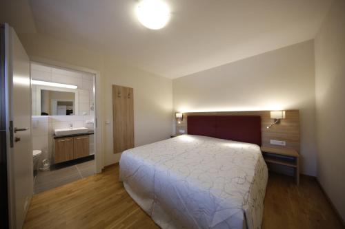 Voodi või voodid majutusasutuse Appartement Central by Schladmingurlaub toas