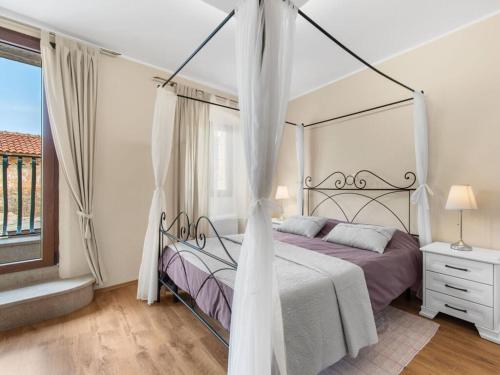 Ένα ή περισσότερα κρεβάτια σε δωμάτιο στο Rustic Villa San Vincenti