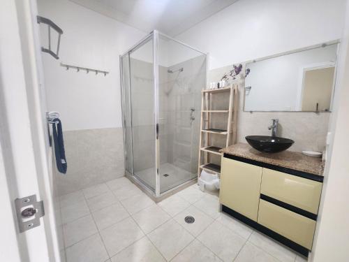 a bathroom with a shower and a sink at Unit 34 Seafront Estate in Jurien Bay
