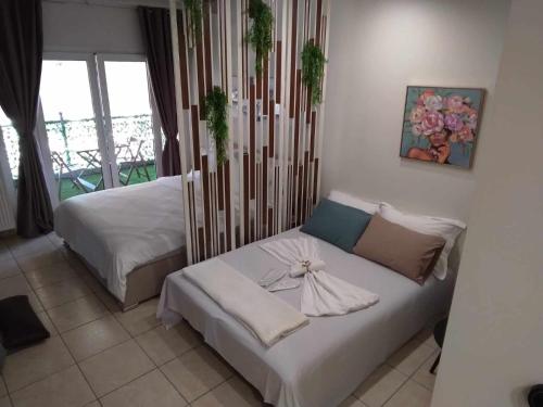 Postel nebo postele na pokoji v ubytování Central Apartments City Center