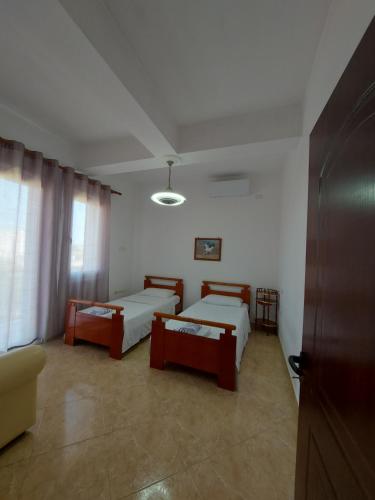 Krevet ili kreveti u jedinici u okviru objekta Guest House Irvin