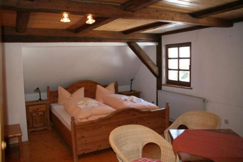 Postelja oz. postelje v sobi nastanitve Ferienhaus Henneberg