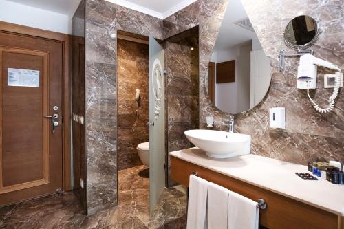 Koupelna v ubytování Port Nature Luxury Resort