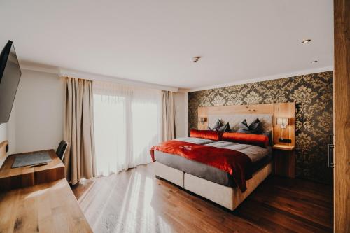 Postel nebo postele na pokoji v ubytování CHALET G12 - Mountain Luxury Apartments