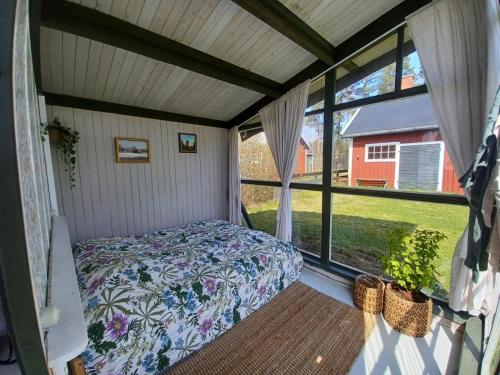 Postel nebo postele na pokoji v ubytování Hemma fran Hemma - Glamping