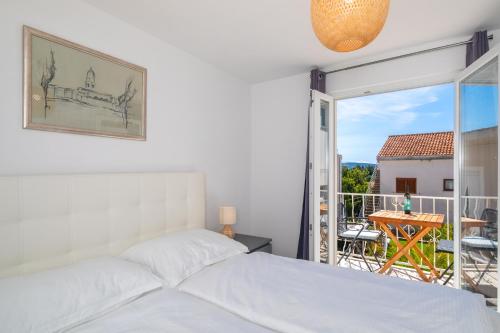 Postel nebo postele na pokoji v ubytování Apartments Soul