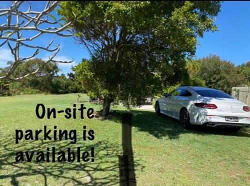 an image of a car parked in a field at Cruisin In Byron in Byron Bay