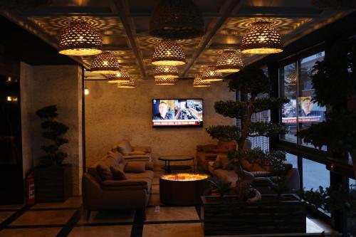 Χώρος καθιστικού στο Iron Loft Hotel