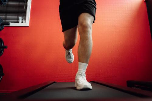 a person is standing on a treadmill in a gym at Best Western Tingvold Park Hotel in Steinkjer