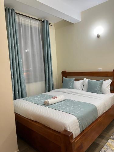 Katil atau katil-katil dalam bilik di The comfortplace Nakuru cbd